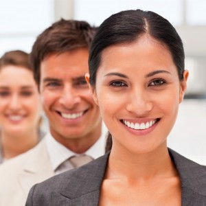 Closeup portrait of confident happy business men and women in a row